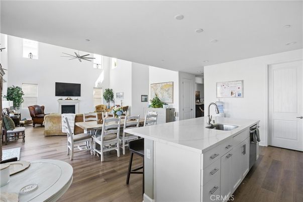 Dining room, Fireplace, Interior, Kitchen, Living room, Pendant Lights, Recessed Lighting, Wood Texture Flooring