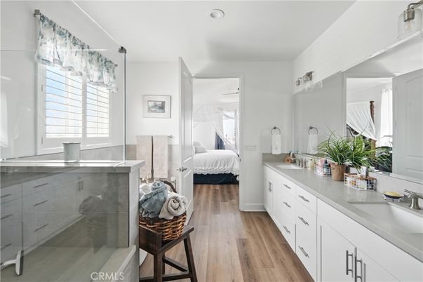 Bathroom, Bedroom, Dual Sink Vanities, Glass Shower, Interior, Wood Texture Flooring