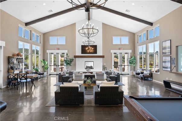 Billiard Table, Chandelier, Dining room, Fireplace, Game Room, Interior, Living room, Pendant Lights, Piano, Recessed Lighting, Wooden Beams