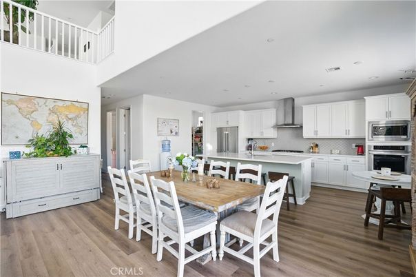 Dining room, Interior, Kitchen, Recessed Lighting, Stainless Steel Appliances, Wood Texture Flooring