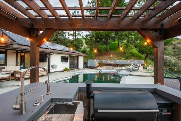 Exterior, Pool, Solar Panels