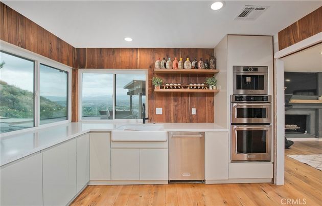 Interior, Kitchen, Recessed Lighting, Stainless Steel Appliances, Wood Texture Flooring, Wooden Walls