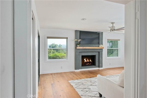 Fireplace, Interior, Living room, Recessed Lighting, Wood Texture Flooring