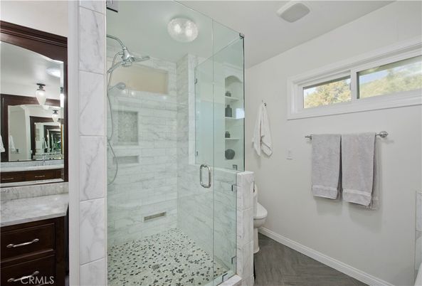 Bathroom, Glass Shower, Interior, Marble Walls, Wood Texture Flooring