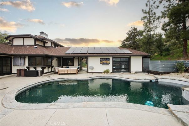 Exterior, Pool, Solar Panels