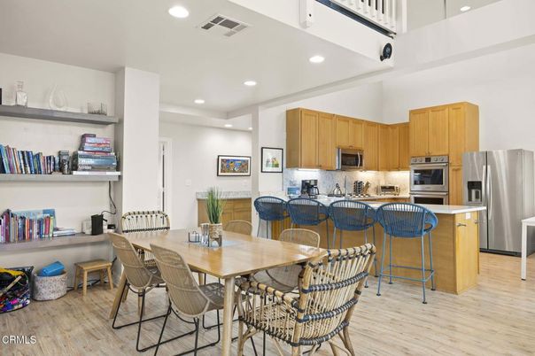 Dining room, Interior, Kitchen, Recessed Lighting, Stainless Steel Appliances, Wood Texture Flooring