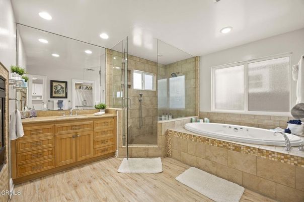 Bathroom, Dual Sink Vanities, Glass Shower, Interior, Recessed Lighting, Wood Texture Flooring