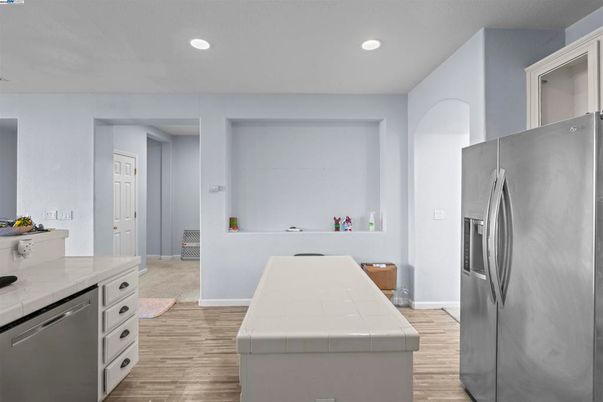 Interior, Kitchen, Recessed Lighting, Stainless Steel Appliances, Tile Countertops, Wood Texture Flooring