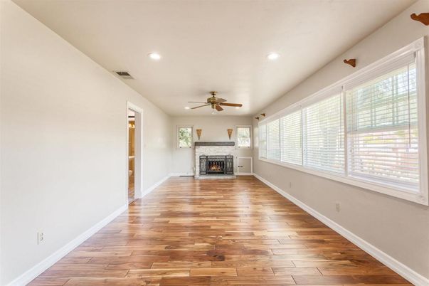 Empty room, Fireplace, Interior, Recessed Lighting, Wood Texture Flooring