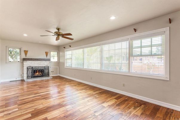 Empty room, Fireplace, Interior, Recessed Lighting, Wood Texture Flooring