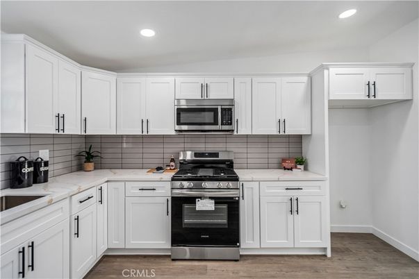 Interior, Kitchen, Recessed Lighting, Stainless Steel Appliances, Wood Texture Flooring