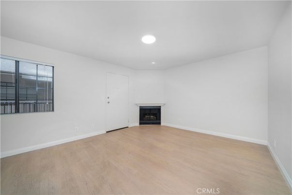 Empty room, Fireplace, Interior, Recessed Lighting, Wood Texture Flooring