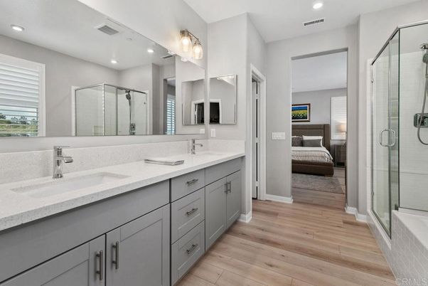 Bathroom, Bedroom, Dual Sink Vanities, Glass Shower, Interior, Recessed Lighting, Wood Texture Flooring