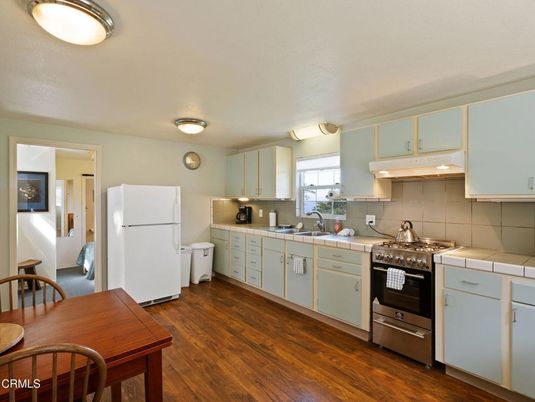 Interior, Kitchen, Tile Countertops, Wood Texture Flooring
