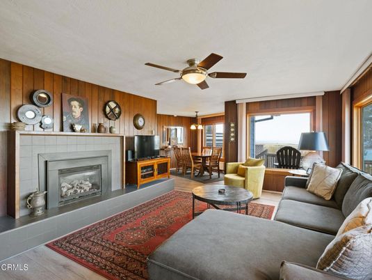 Dining room, Fireplace, Interior, Living room, Pendant Lights, Wood Texture Flooring, Wooden Walls