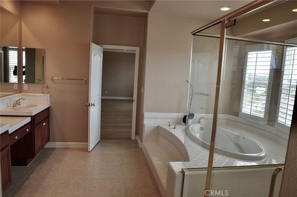 Bathroom, Dual Sink Vanities, Glass Shower, Interior, Recessed Lighting, Tile Countertops