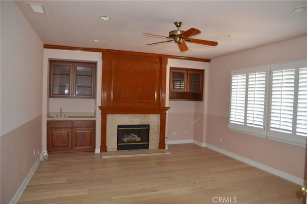 Empty room, Fireplace, Interior, Recessed Lighting, Wood Texture Flooring
