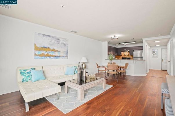Dining room, Interior, Kitchen, Living room, Recessed Lighting, Stainless Steel Appliances, Wood Texture Flooring