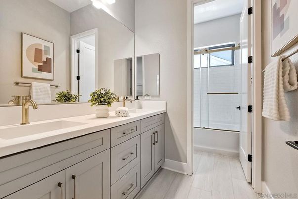 Bathroom, Dual Sink Vanities, Glass Shower, Interior, Wood Texture Flooring