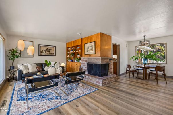 Dining room, Fireplace, Interior, Living room, Pendant Lights, Wood Texture Flooring, Wooden Walls