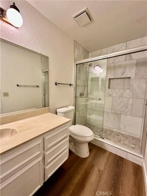 Bathroom, Glass Shower, Interior, Marble Walls, Wood Texture Flooring