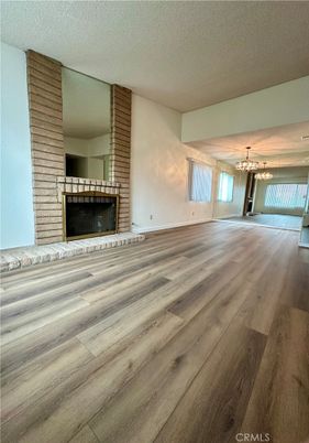 Chandelier, Empty room, Fireplace, Interior, Wood Texture Flooring
