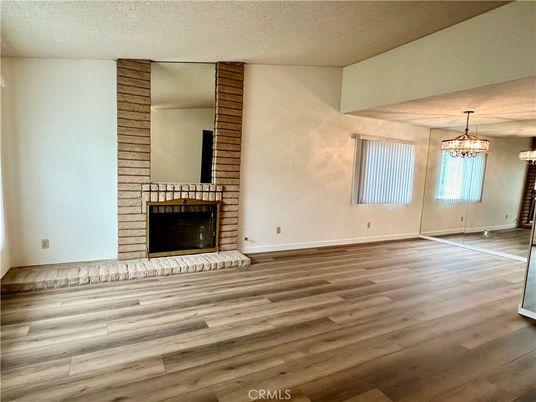 Empty room, Fireplace, Interior, Pendant Lights, Wood Texture Flooring