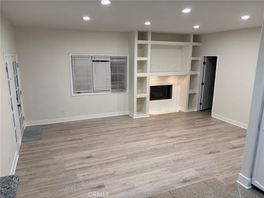 Empty room, Fireplace, Interior, Recessed Lighting, Wood Texture Flooring
