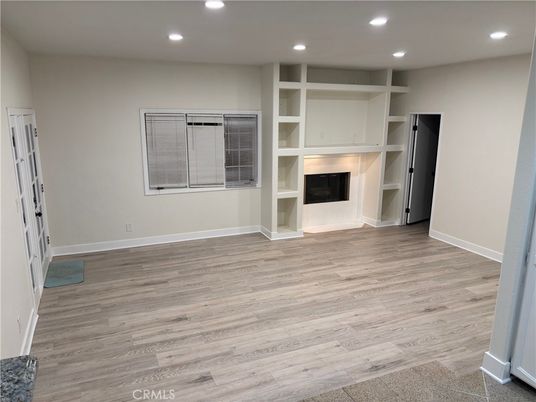 Empty room, Fireplace, Interior, Recessed Lighting, Wood Texture Flooring