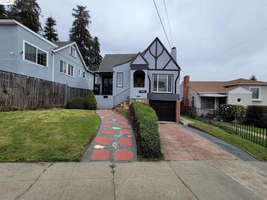Attached, Exterior, Facade, Tudor Revival