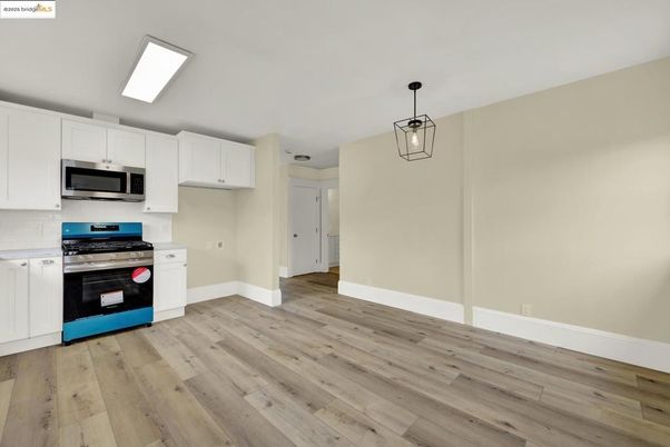 Interior, Kitchen, Pendant Lights, Stainless Steel Appliances, Wood Texture Flooring