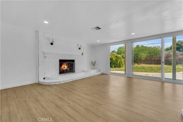 Empty room, Fireplace, Interior, Recessed Lighting, Wood Texture Flooring