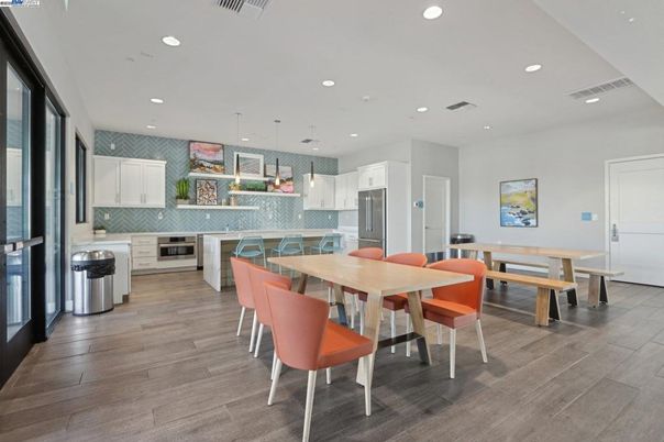 Dining room, Interior, Kitchen, Pendant Lights, Recessed Lighting, Stainless Steel Appliances, Wood Texture Flooring