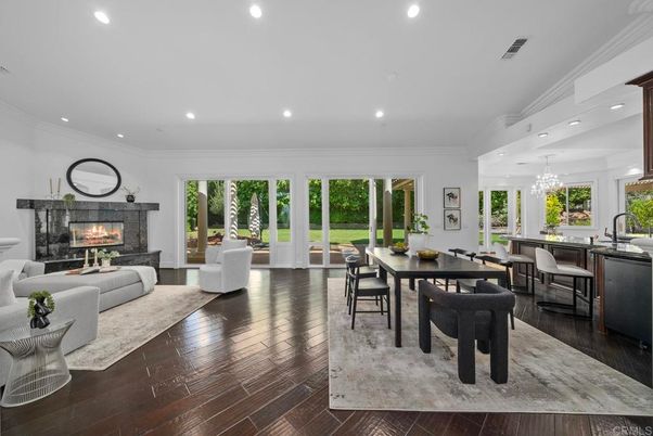 Chandelier, Dining room, Fireplace, Interior, Living room, Recessed Lighting, Wood Texture Flooring