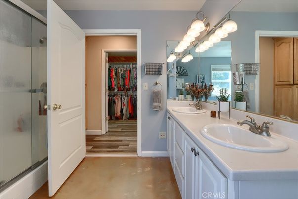 Bathroom, Dual Sink Vanities, Glass Shower, Interior, Walk-in Closets, Wood Texture Flooring
