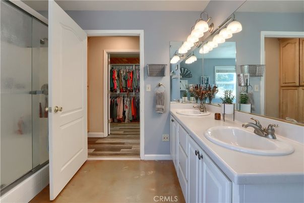 Bathroom, Dual Sink Vanities, Glass Shower, Interior, Walk-in Closets, Wood Texture Flooring