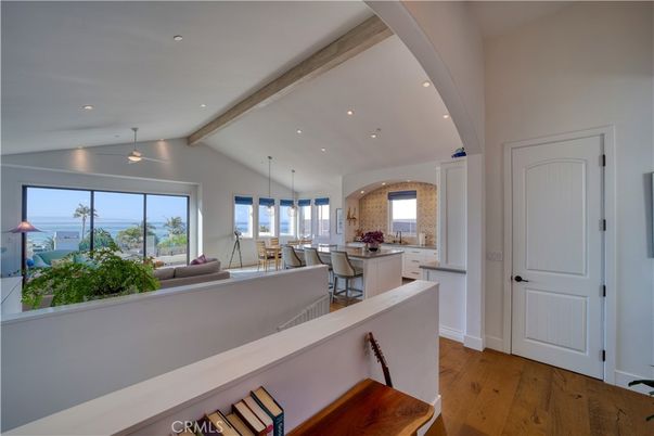Dining room, Interior, Kitchen, Living room, Pendant Lights, Recessed Lighting, Water, Wooden Beams, Wood Texture Flooring