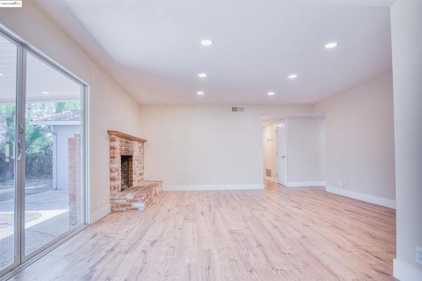 Empty room, Fireplace, Interior, Recessed Lighting, Wood Texture Flooring