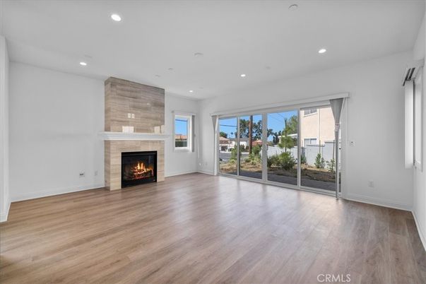 Empty room, Fireplace, Interior, Recessed Lighting, Wood Texture Flooring