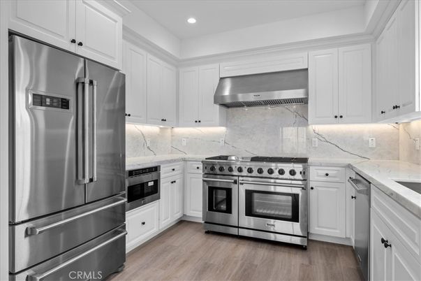 Interior, Kitchen, Recessed Lighting, Stainless Steel Appliances, Wood Texture Flooring