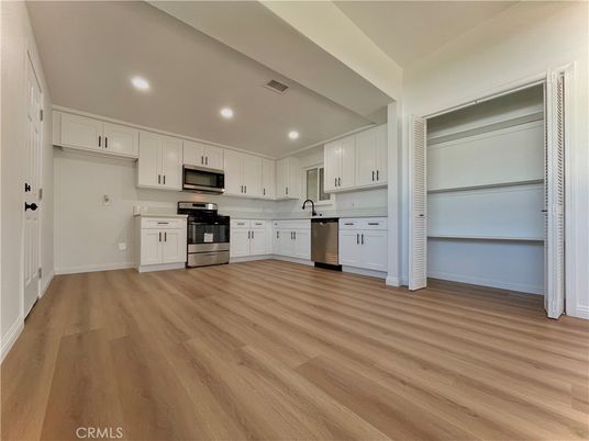 Interior, Kitchen, Recessed Lighting, Stainless Steel Appliances, Wood Texture Flooring