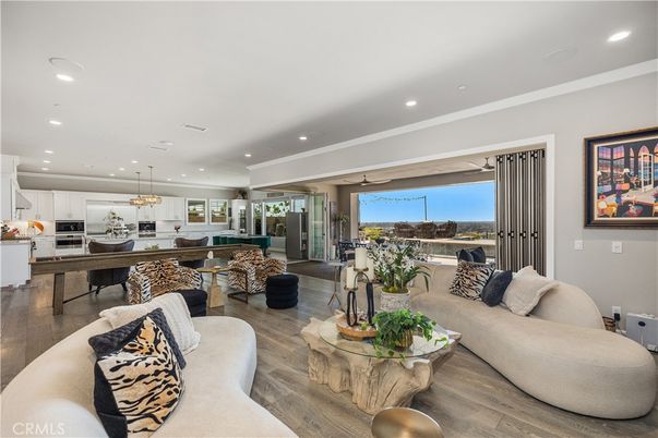 Dining room, Interior, Kitchen, Living room, Pendant Lights, Recessed Lighting, Stainless Steel Appliances, Wood Texture Flooring