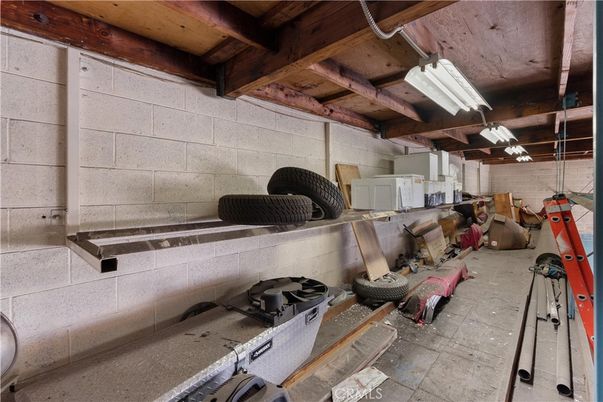 Garage, Interior, Stone Walls, Wooden Beams