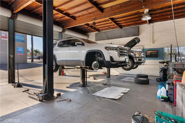 Garage, Interior, Stone Walls, Wooden Beams