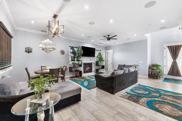 Dining room, Fireplace, Interior, Living room, Pendant Lights, Recessed Lighting, Wood Texture Flooring