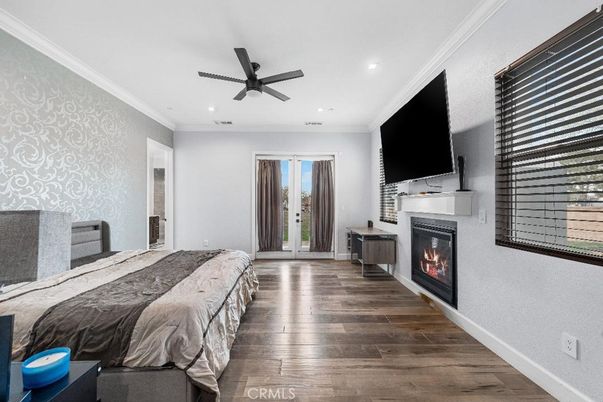 Bedroom, Fireplace, Interior, Recessed Lighting, Wood Texture Flooring