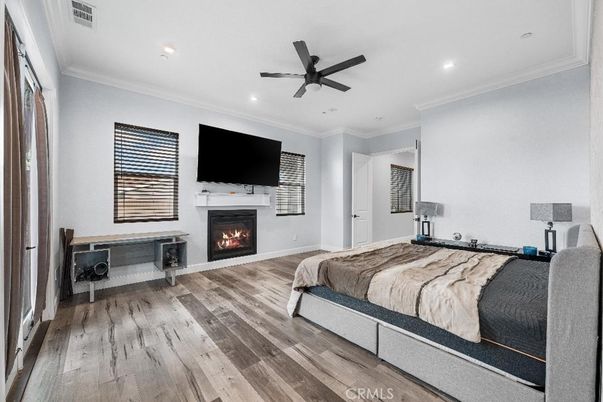 Bedroom, Fireplace, Interior, Recessed Lighting, Wood Texture Flooring