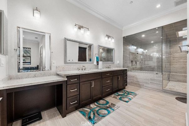Bathroom, Dual Sink Vanities, Glass Shower, Interior, Recessed Lighting, Wood Texture Flooring