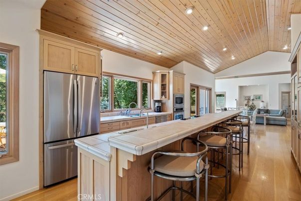 Interior, Kitchen, Living room, Recessed Lighting, Stainless Steel Appliances, Tile Countertops, Wooden Ceilings, Wood Texture Flooring