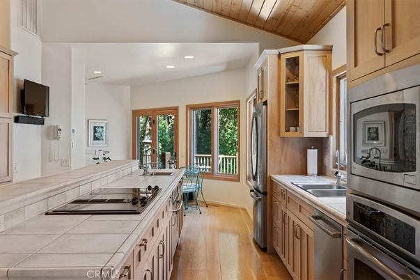 Interior, Kitchen, Recessed Lighting, Tile Countertops, Wood Texture Flooring